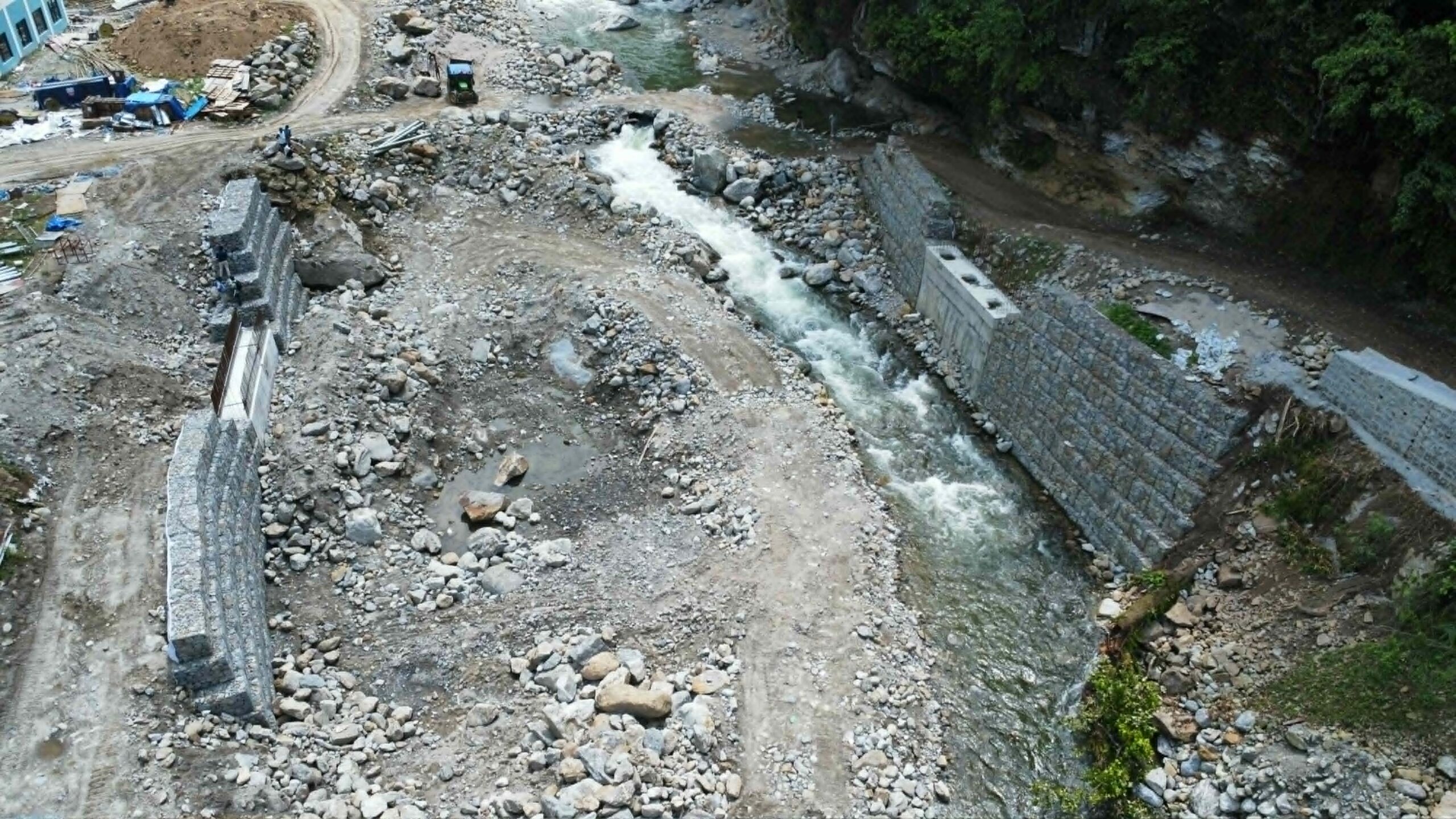 Concrete bridge under construction over Thumlung stream