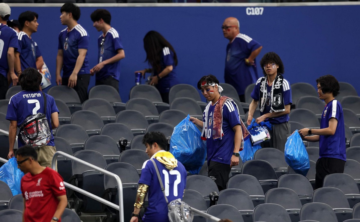 ‘This is our culture’: Japan fans clean up World Cup stadium