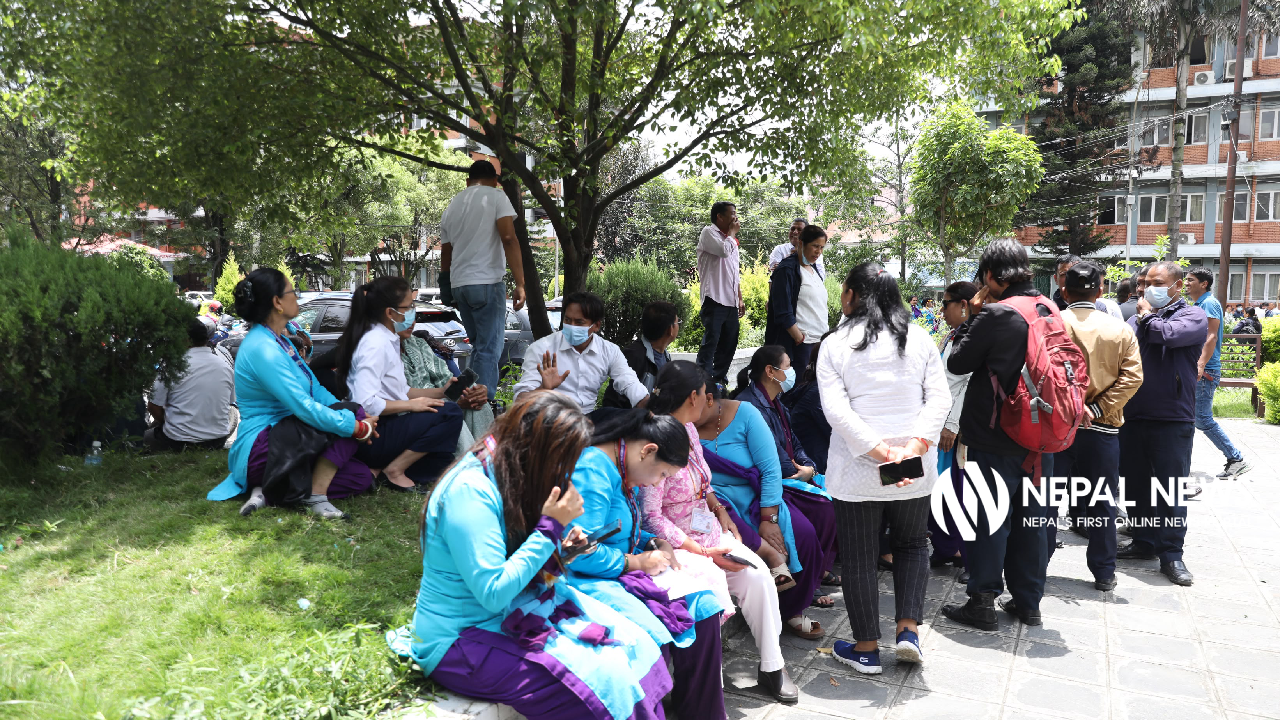 Contract employees stage sit-in against government’s outsourcing plan