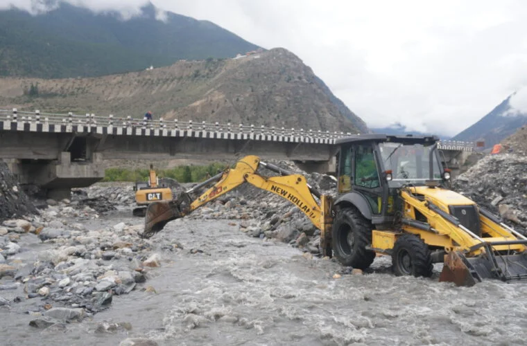 River channelization begins to protect Syang River Bridge from siltation