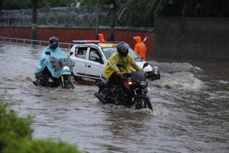 Heavy rain causes waterlogging in Maitighar; traffic disrupted (Photo Feature)