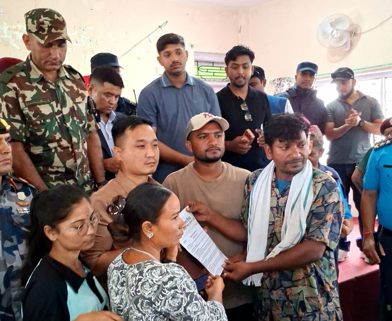 Home Minister Gurung meets marching loan shark victims in Nijgadh